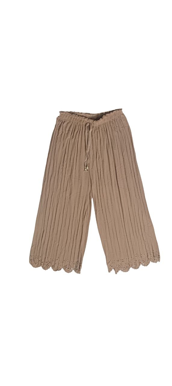 "Elegant Coren imported cutwork palazzo in premium polyester-lycra fabric with intricate detailing and flowy silhouette"